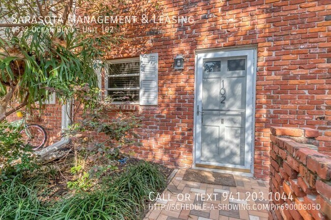 Building Photo - Ocean View 2 Bed 1.5 Bath 2-Story Condo in...