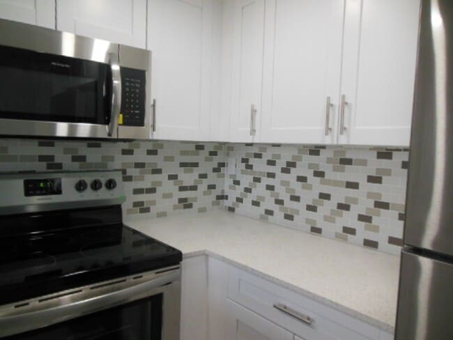Building Photo - One Bedroom One Bathroom! WATERFRONT COMMU...