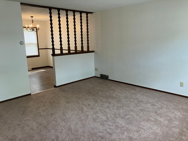 Living room looking into dinning room - 4357 45th Ave N