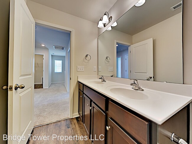 Building Photo - 4 br, 2.5 bath House - 6303 Mosley Glen Drive