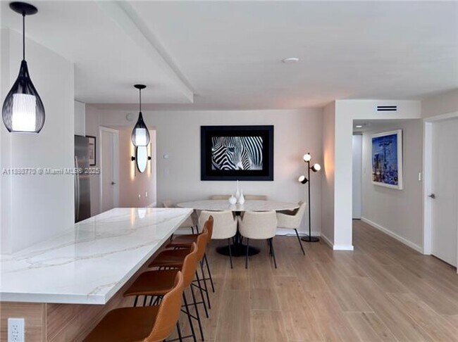 Building Photo - 10230 Collins Ave