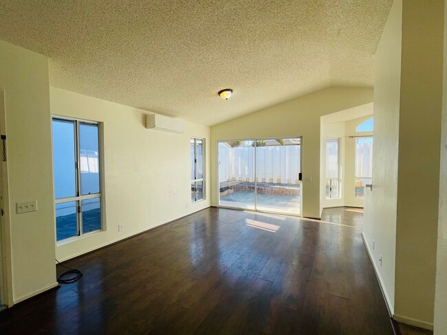 Building Photo - Partly Furnished 3-bedroom, 2-bath home at...