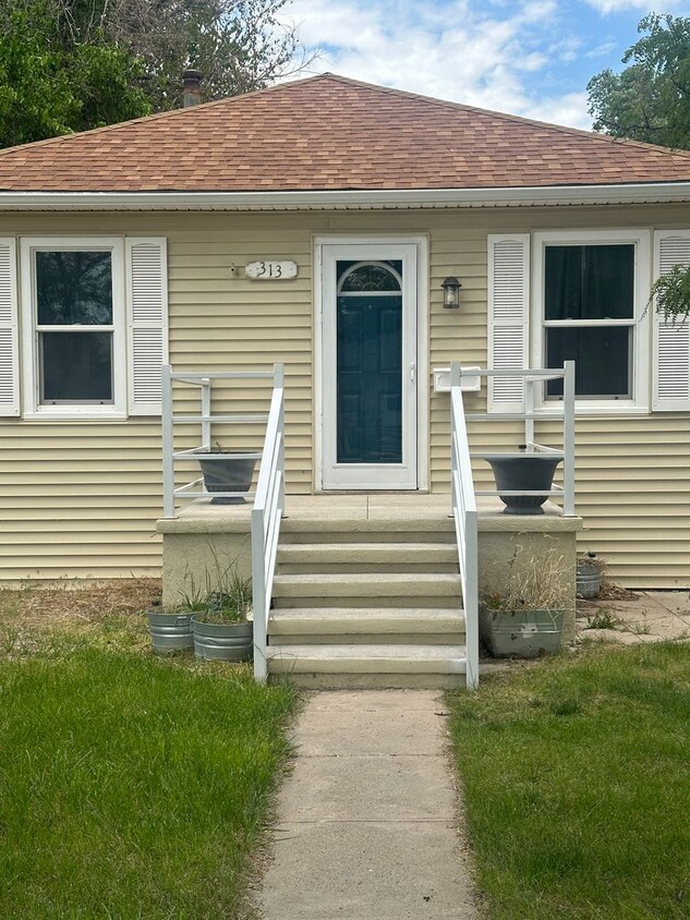 Primary Photo - Three Bedroom, Two Bathroom Home! One car ...