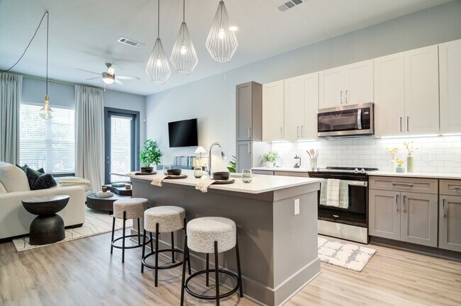 Building Photo - The Collier Sugar Hill Luxury Apartments
