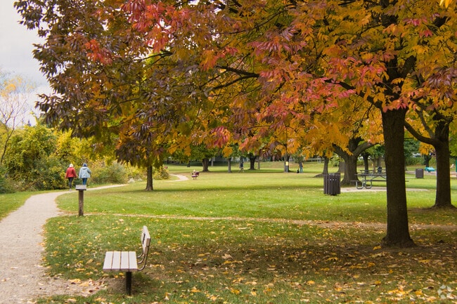 People in Park enjoying the outdoors during the Autumn season in Grandville, Michigan