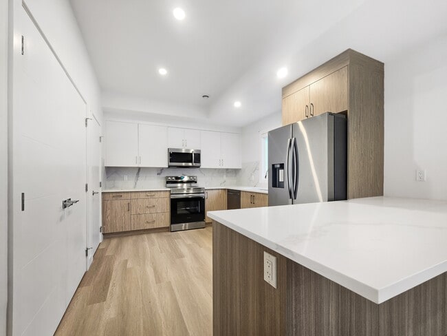 Building Photo - 6123-6133 33 Ave NW