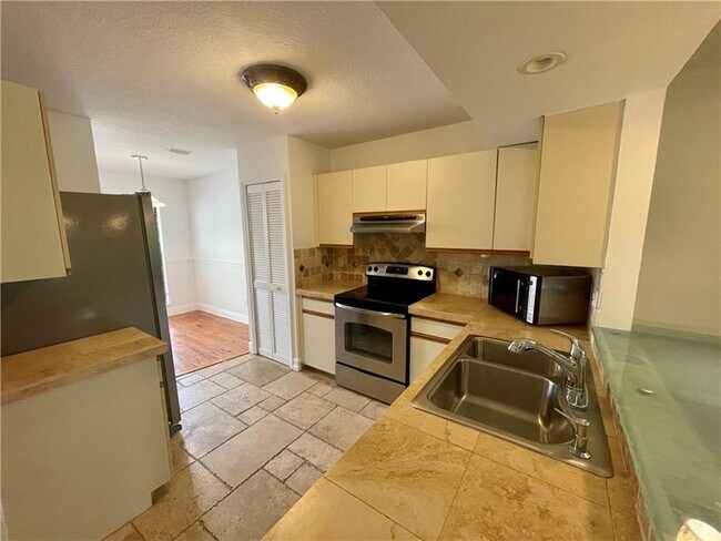 Foto del edificio - 10253 Riverbend Terrace