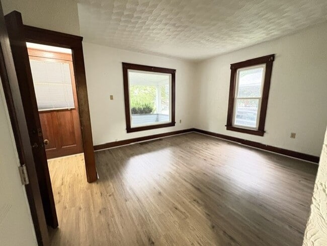 Building Photo - Updated West Akron Home with Flexible Living Space, Large Yard & Garage