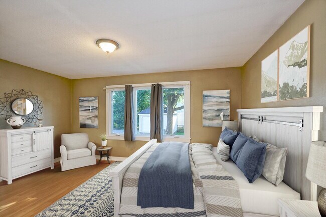 Foto del edificio - Charming 4-Bedroom Home with Gleaming Hardwood Floors in Vibrant Minneapolis Neighborhood!