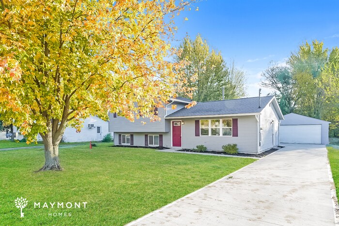 Building Photo - Inviting North Ridgeville Home with Sunroom