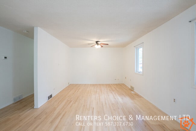 Building Photo - Main Floor Suite with No Yard Care Duties,...