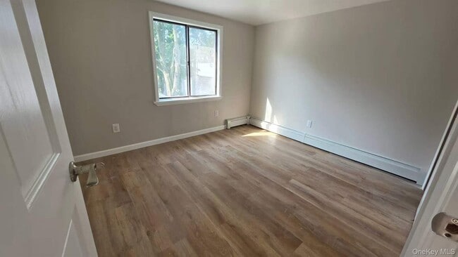Building Photo - 206-66 46th Ave