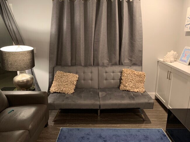 Futon couch folds into a bed - 3309 Fenelon St