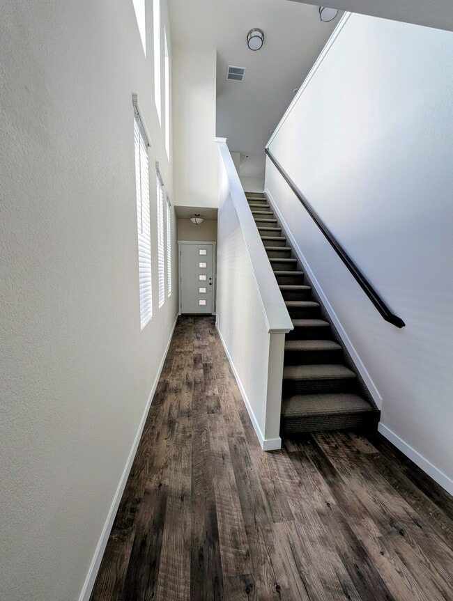 Interior stairs lead to apartment. - 13629 Frost Bitten Grv