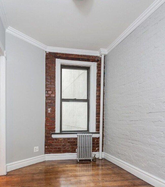 Building Photo - Bright and Updated East Village Apartment