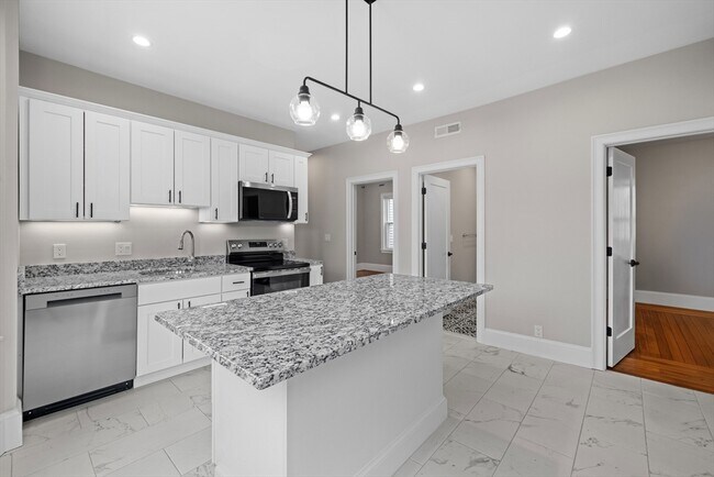 Foto del edificio - 921-923-923 E Broadway