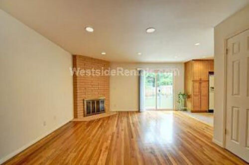 Fireplace and living room - 6700 Capistrano Ave