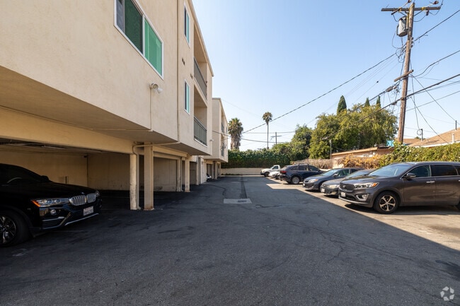 Parking Lot - Pet Friendly Apartment Complex in South LA - Gated Parking, Laundry In-Units, Manager On-Site
