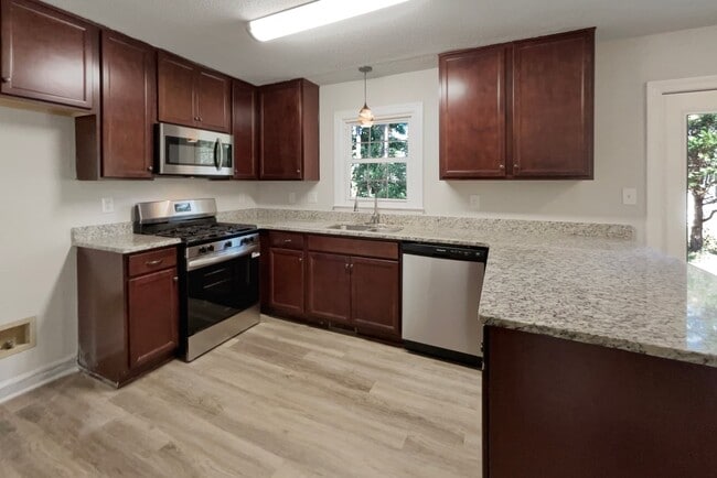 Building Photo - 6010 River Landings Dr