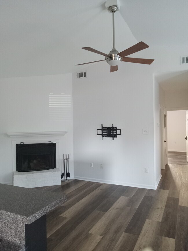 Living room with fireplace - 7744 Lasalle Ave