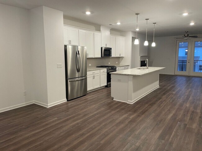 Building Photo - WOW! 4 bedroom, 3.5 bathroom townhome in T...