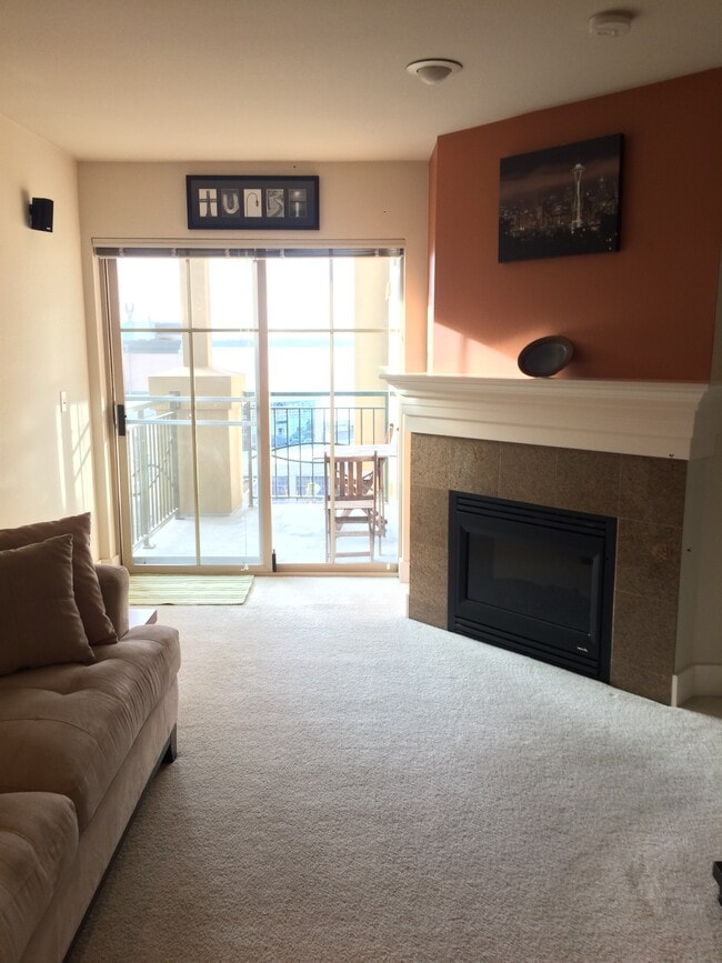 Living room with fireplace - 123 Queen Anne Ave N