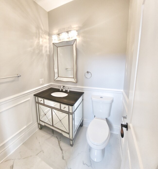 Powder Room - 7130 W Highland Ave