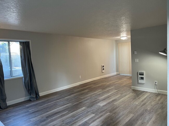 Building Photo - NEWLY REFRESHED Two Bedroom Townhome Style...