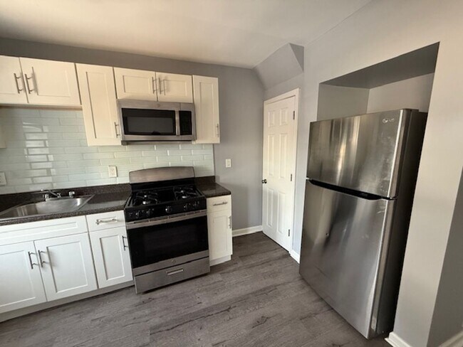 Building Photo - Renovated 3-Bedroom Home with Porch Front ...