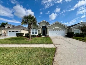 Building Photo - 8127 Fan Palm Way