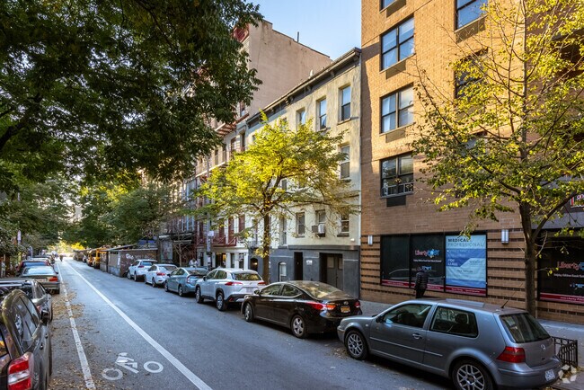Building Photo - 100-102 E 4th St