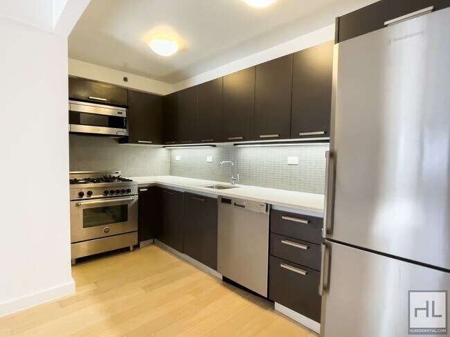 Foto del edificio - STUNNING LUXURY 4 BED IN PRIME MURRAY HILL...
