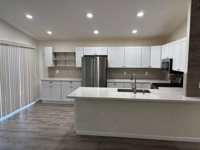 Building Photo - Freshly Remodeled 4 bedroom in Red Rock- RV Parking, low maintenance yard and pets welcome!