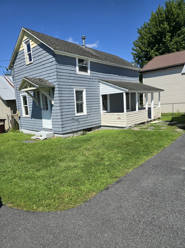 In process of painting house gray - 29 1/2 Center St