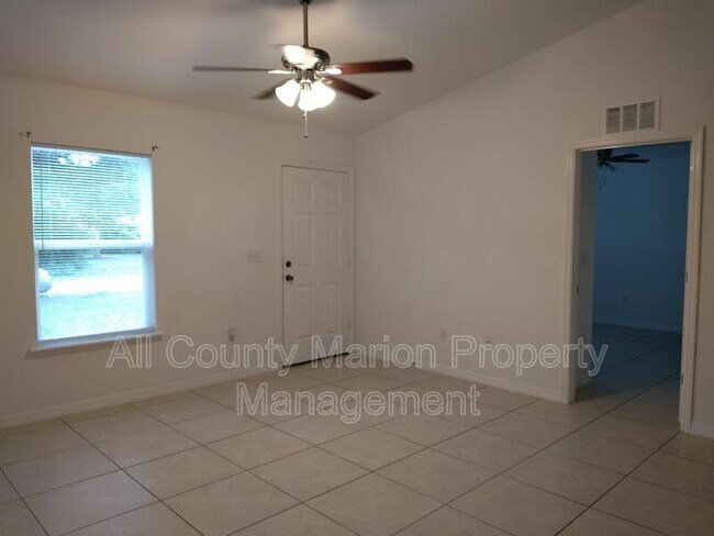Building Photo - 6375 NW 61st Ln