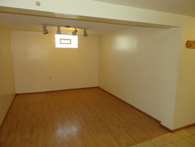 Building Photo - 5000 N Mango Ave