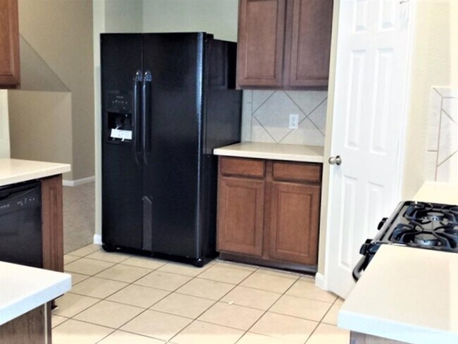 Foto del edificio - 15742 Flagstone Walk Way