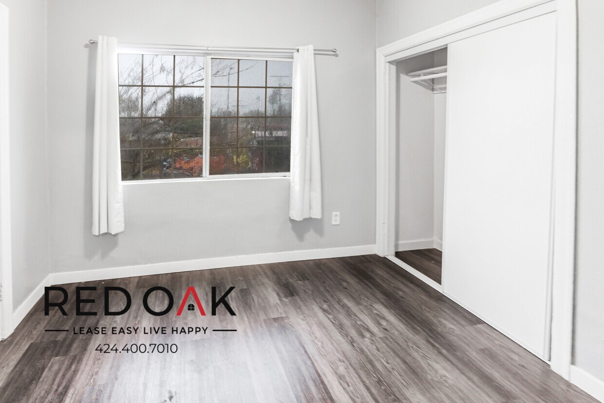 Primary Photo - Charming, Spacious, and Sunny Three Bedroo...
