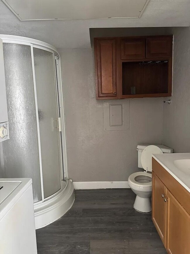Building Photo - Affordable studio condo with shower-only bath, open layout, and convenient location  perfect for ...