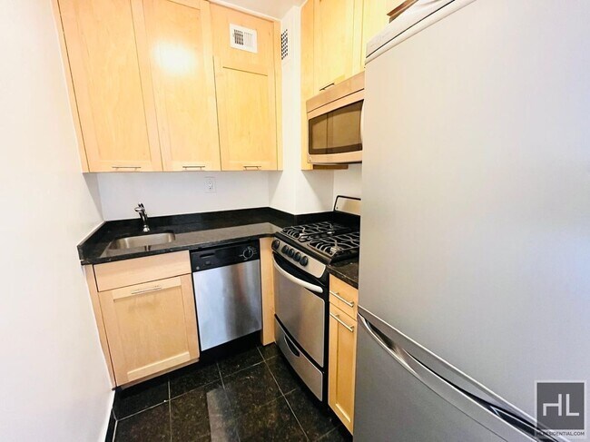Building Photo - E 36th St | Alcove Studio | In-building laundry