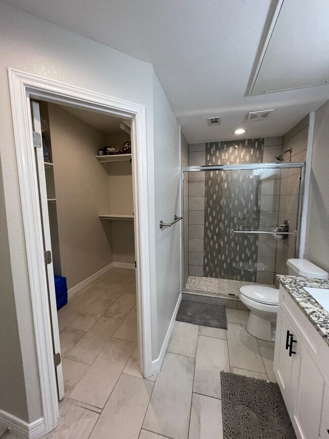 Closet connected to single bathroom - 5550 Spring Valley Rd