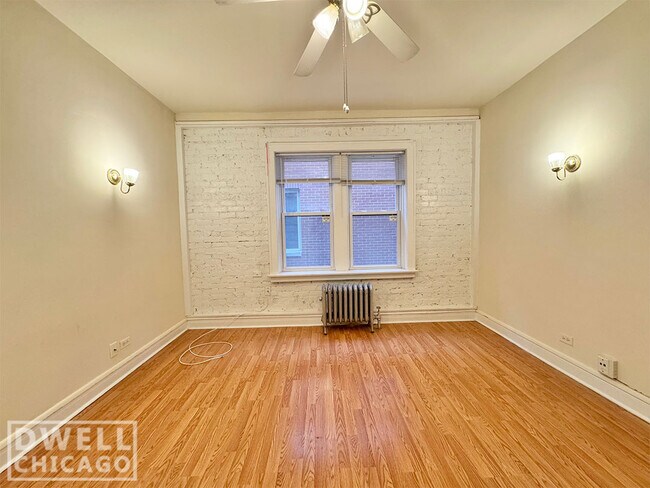 Building Photo - 6900 N Lakewood Ave