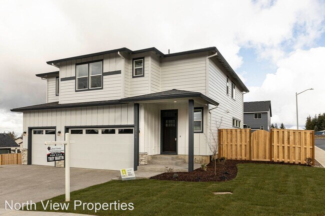Building Photo - 4 br, 2.5 bath House - 1805 NE Robert Rd #A