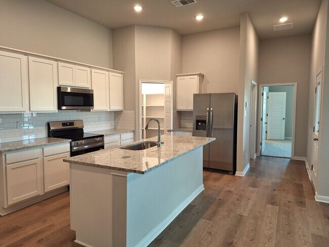Building Photo - Stunning 4x3 Luxury Duplex in Buda, TX!