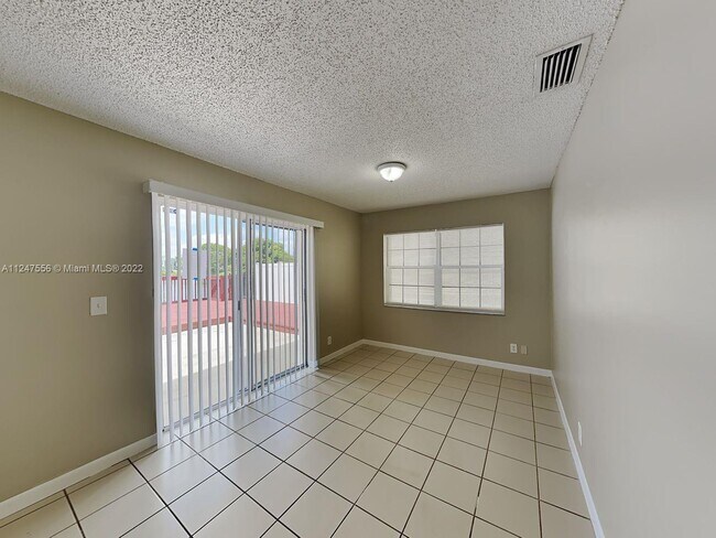 Building Photo - 9880 NW 5th Ct