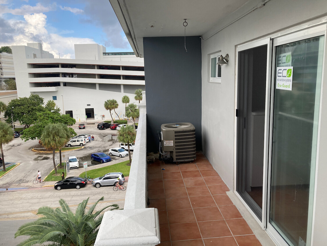 Balcony with new impact windows - 1614 West Ave