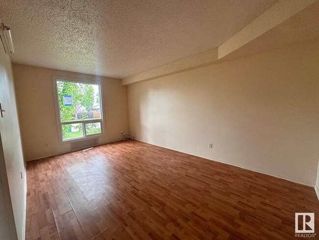 Building Photo - 3115-3144 144 Ave NW