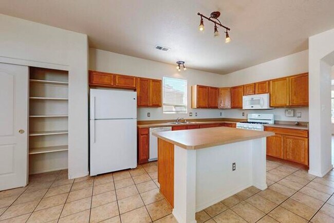 Building Photo - **Application Received** Spacious 3 Bedroo...