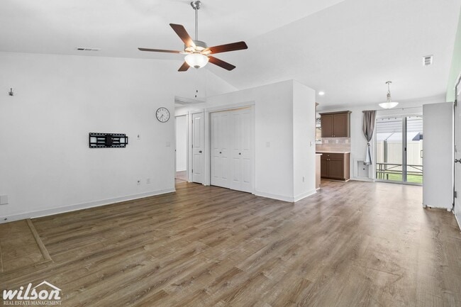 Building Photo - Welcome Home: Big Yard, Garage, and Pets A...