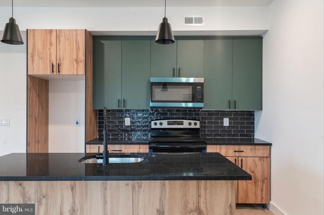 Building Photo - 4181 Mantua Ave